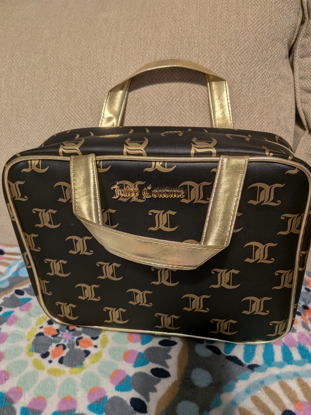 Juicy Couture Black and Gold Travel Bag